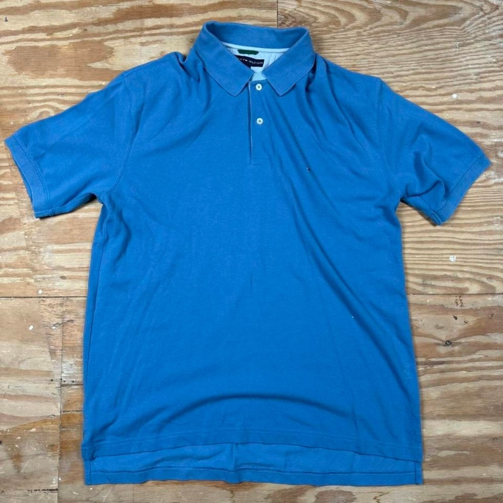 faded blue tommy hilfiger polo shirt